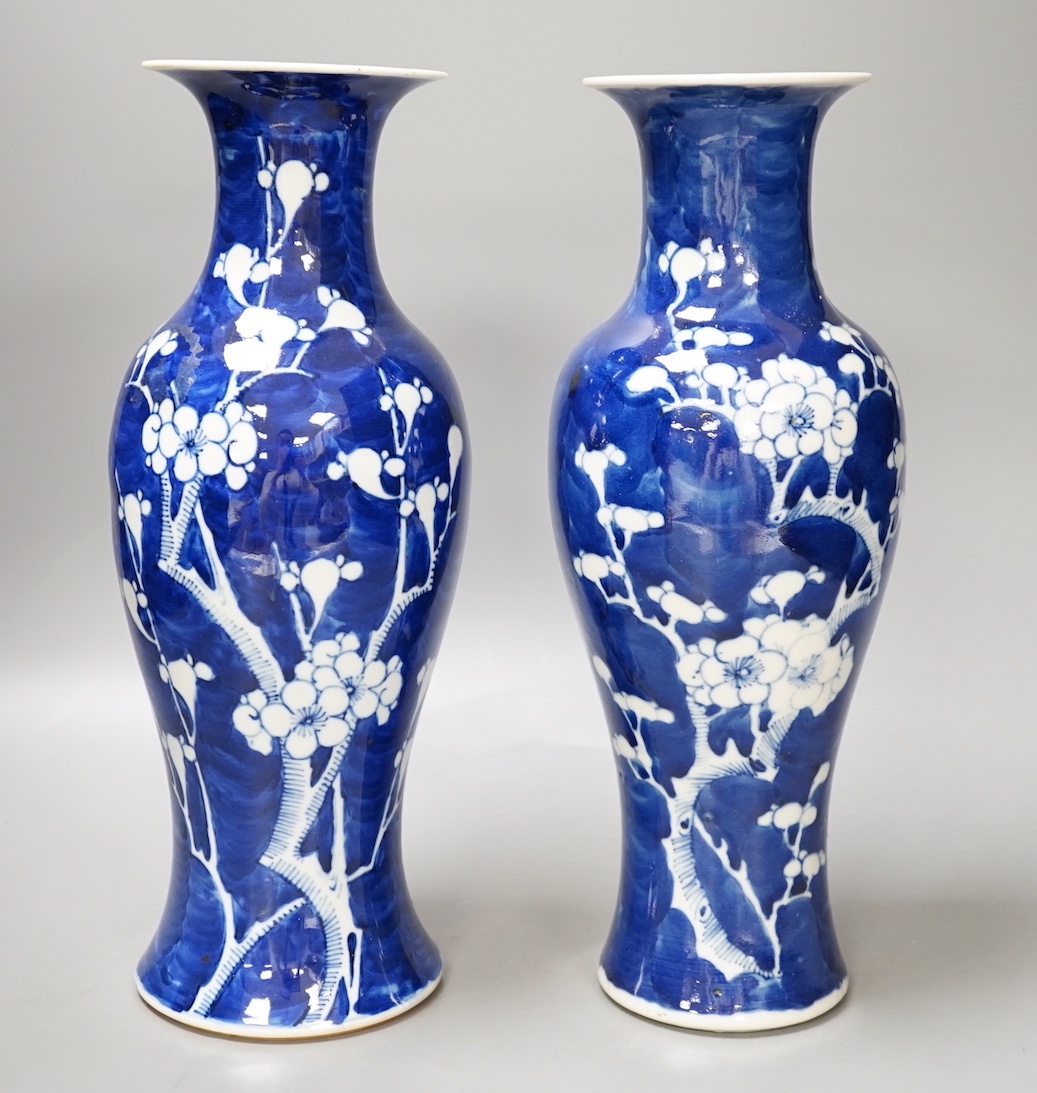 Two 19th century Chinese blue and white prunus vases, 31cm